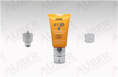 d35mm orange pump tube packaging with transparent cap for sun block lotion