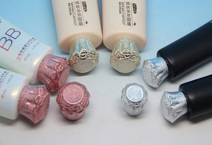 This is a plastic tube with linen-faced metalized cap. This is a plastic tube with linen-faced metalized cap.